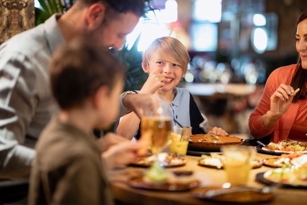 family at restaurant as resized