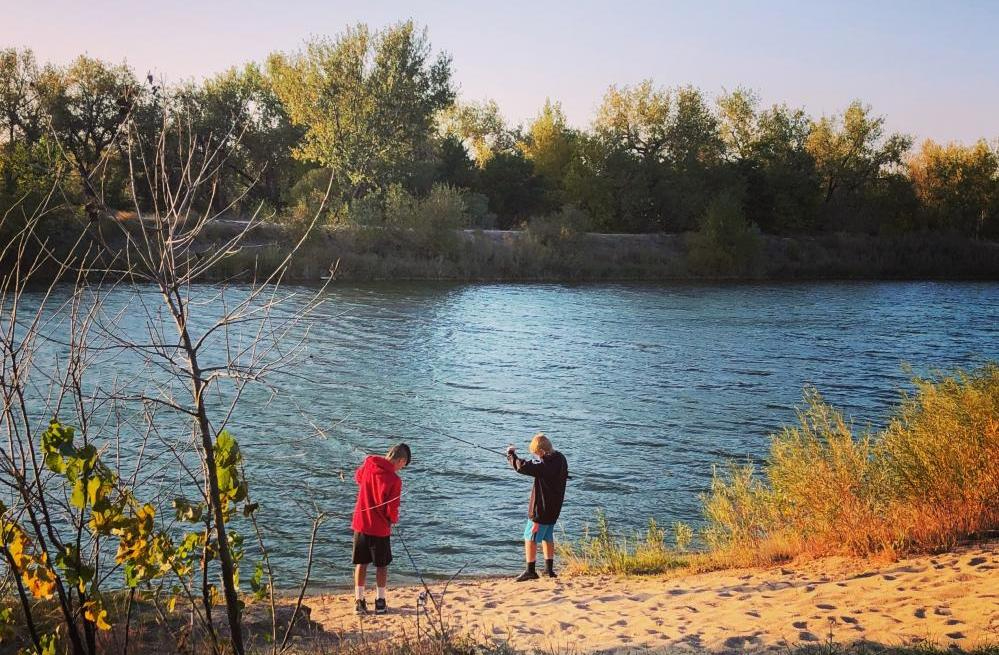 boys fishing on pond 2