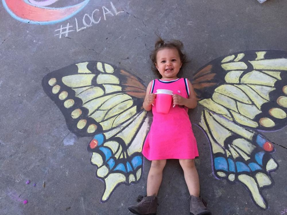 chalk art girl with wings