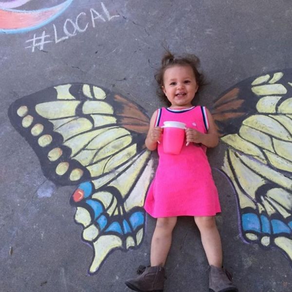 chalk art girl with wings